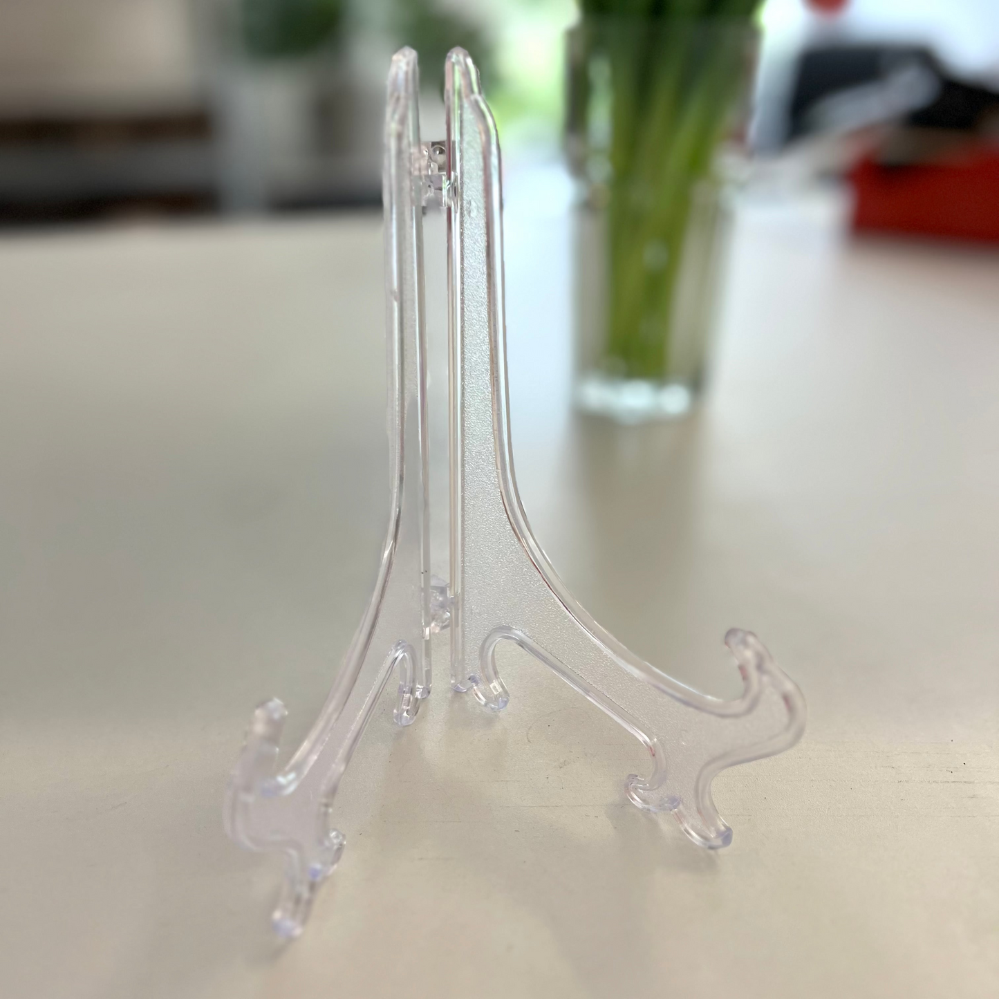 Plastic standaard voor een tegeltje